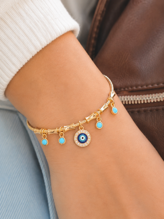 Evil Eye Gold Kada for Women – Adjustable Nazar Charm Fashion Kada with Blue Stone Charms